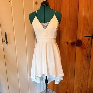 Elegant White Lace-Trimmed Dress